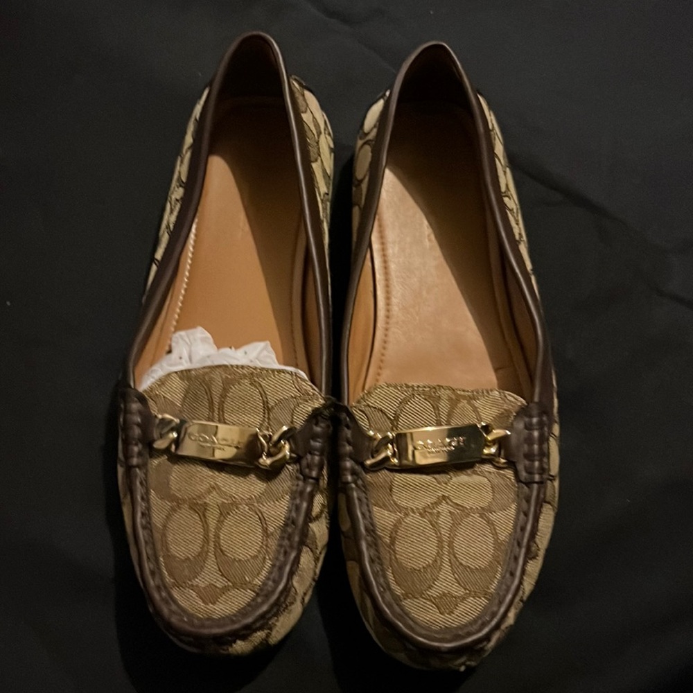 Coach slip ons